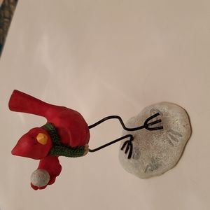 RUSS red bird tossing a snowball